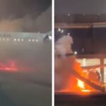 Passageiros evacuam avião após fogo em equipamento no Aeroporto de Guarulhos (SP)